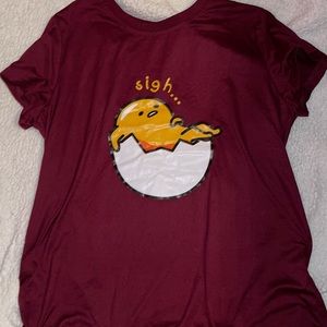Large maroon T-shirt with cartoon print